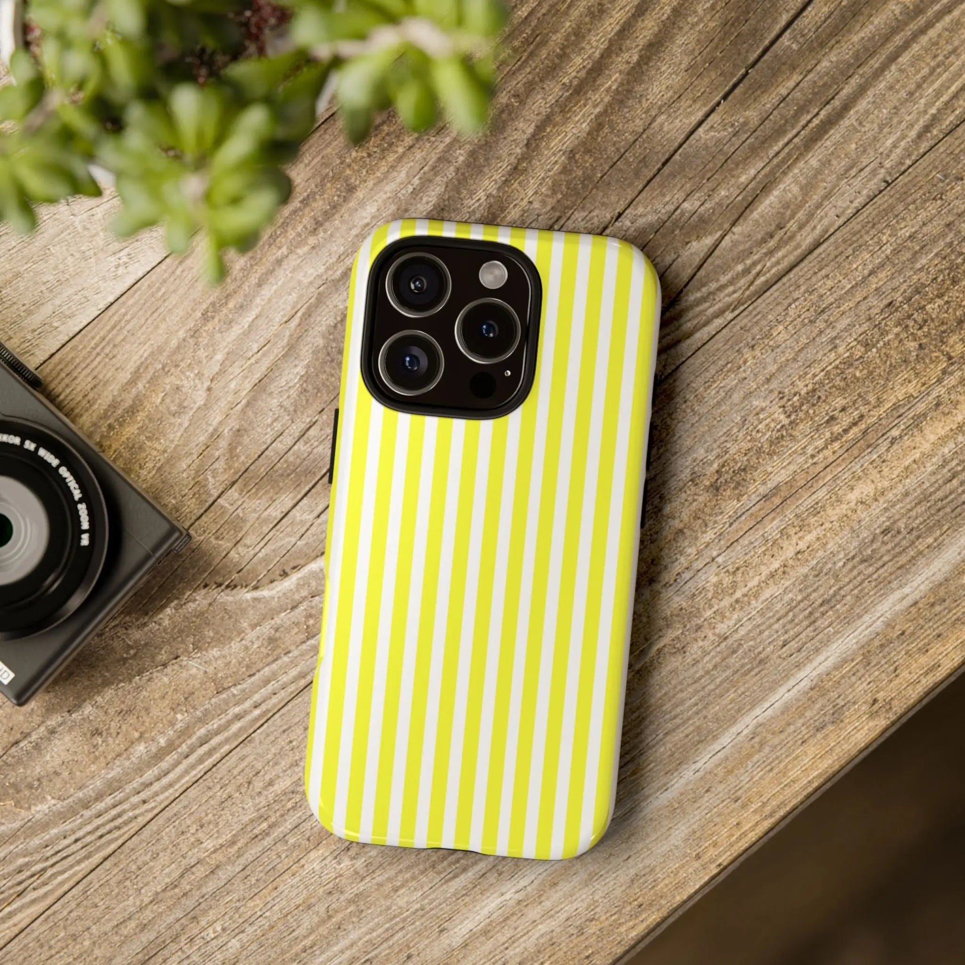 Back side of a banana yellow and white striped tough phone case cover with hard shell protection for iphone samsung google