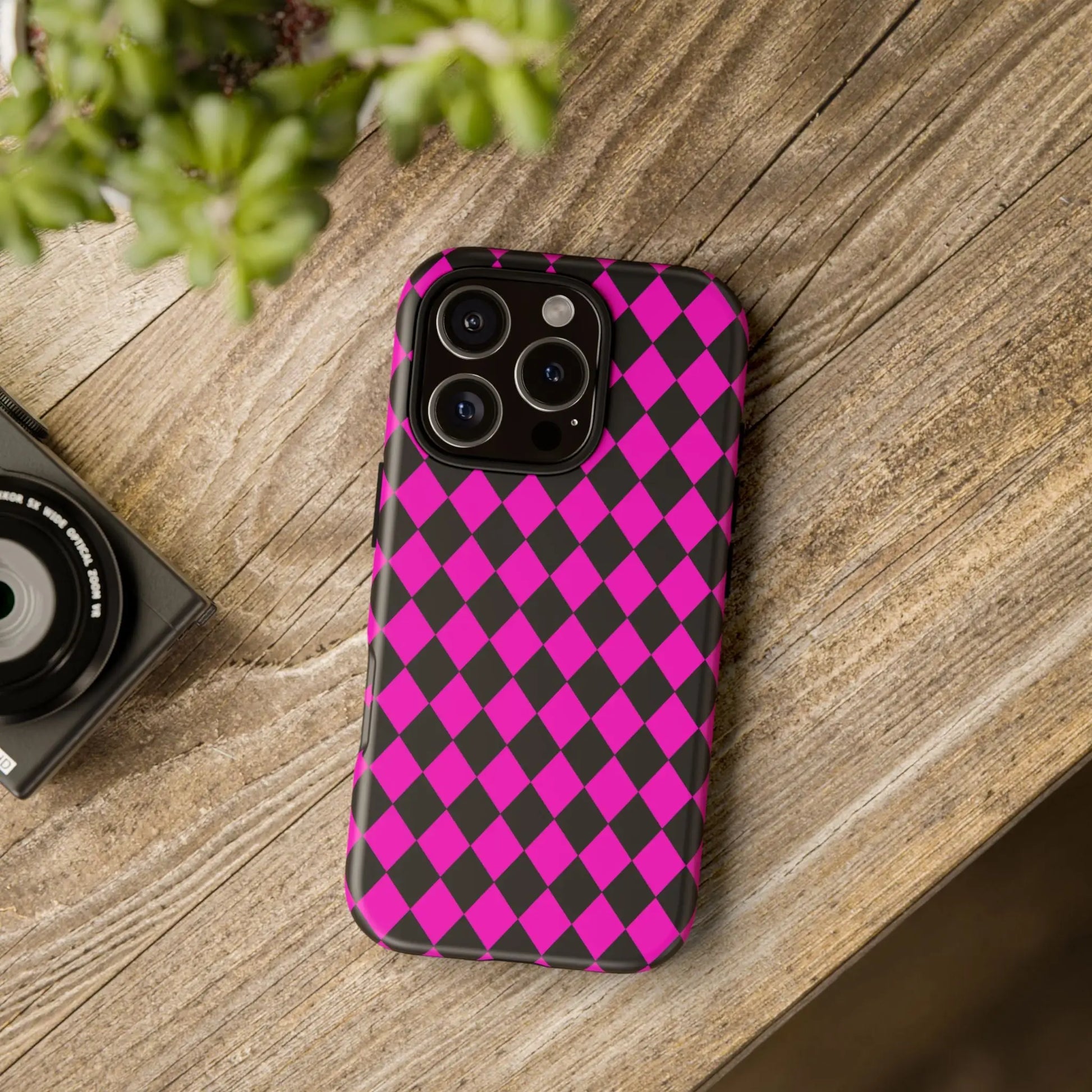 Back side of a vibrant pink black dimond phone case cover with sleek protective design for iphone google s24 and samsung pixel 7