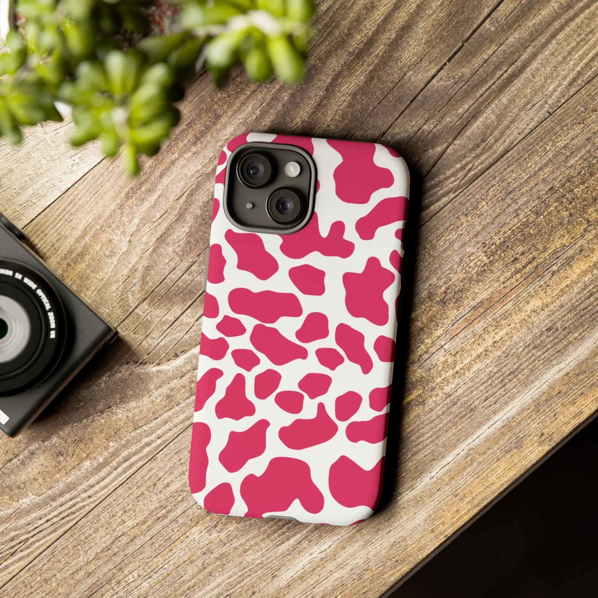Pink cow print phone case cover showing the back side featuring a cute tough protective design in pink and white