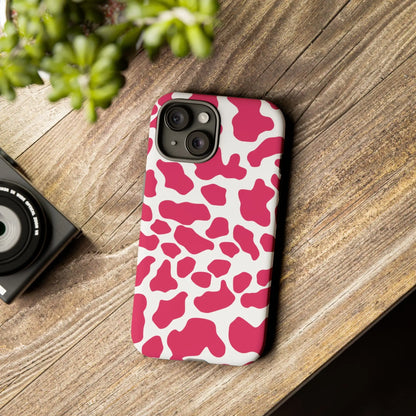 Pink cow print phone case cover showing the back side featuring a cute tough protective design in pink and white