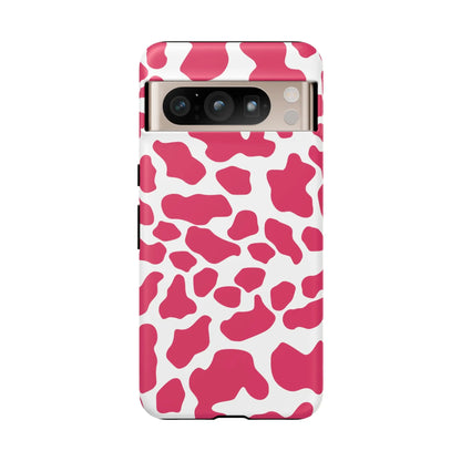 Vibrant pink cow print phone case with white spots sleek tough protective print phone case back view