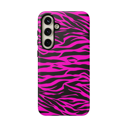 Vibrant pink and black zebra-striped tough phone case showing the back side with durable protective design