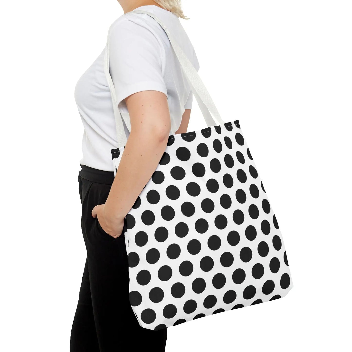 White canvas polka dot tote bag with bold black dots and matching shoulder strap reusable shopping bag