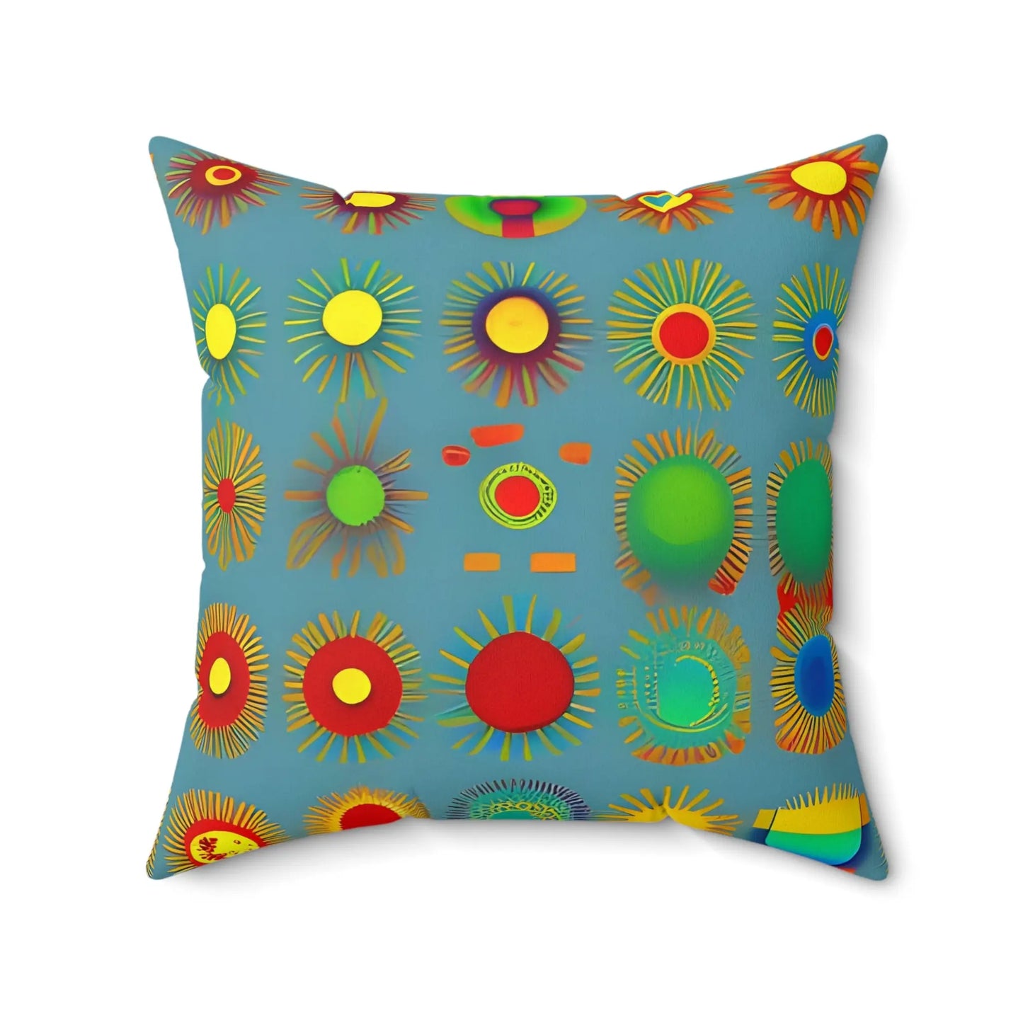 Vibrant sun design square soft pillow in teal fabric with bold red yellow green and orange sunburst pattern motifs