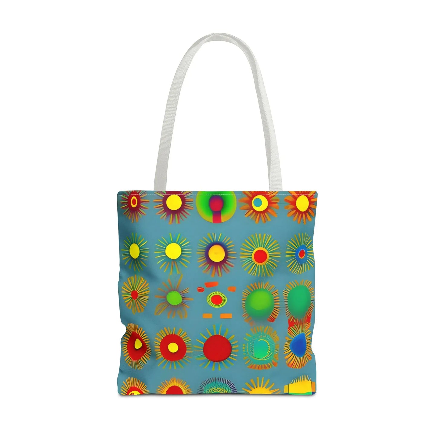 A vibrant blue sun pattern tote bag with colorful stylized sunburst designs and white handles pattern tote bag