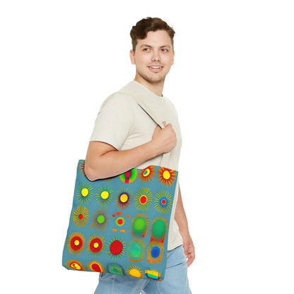 Blue canvas sun pattern tote bag with vibrant colorful stylized suns in red yellow green and blue pattern tote bag