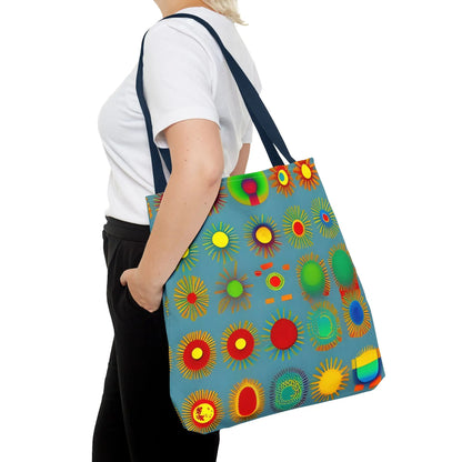 A vibrant blue canvas sun pattern tote bag with colorful sunburst circles in red yellow green and orange