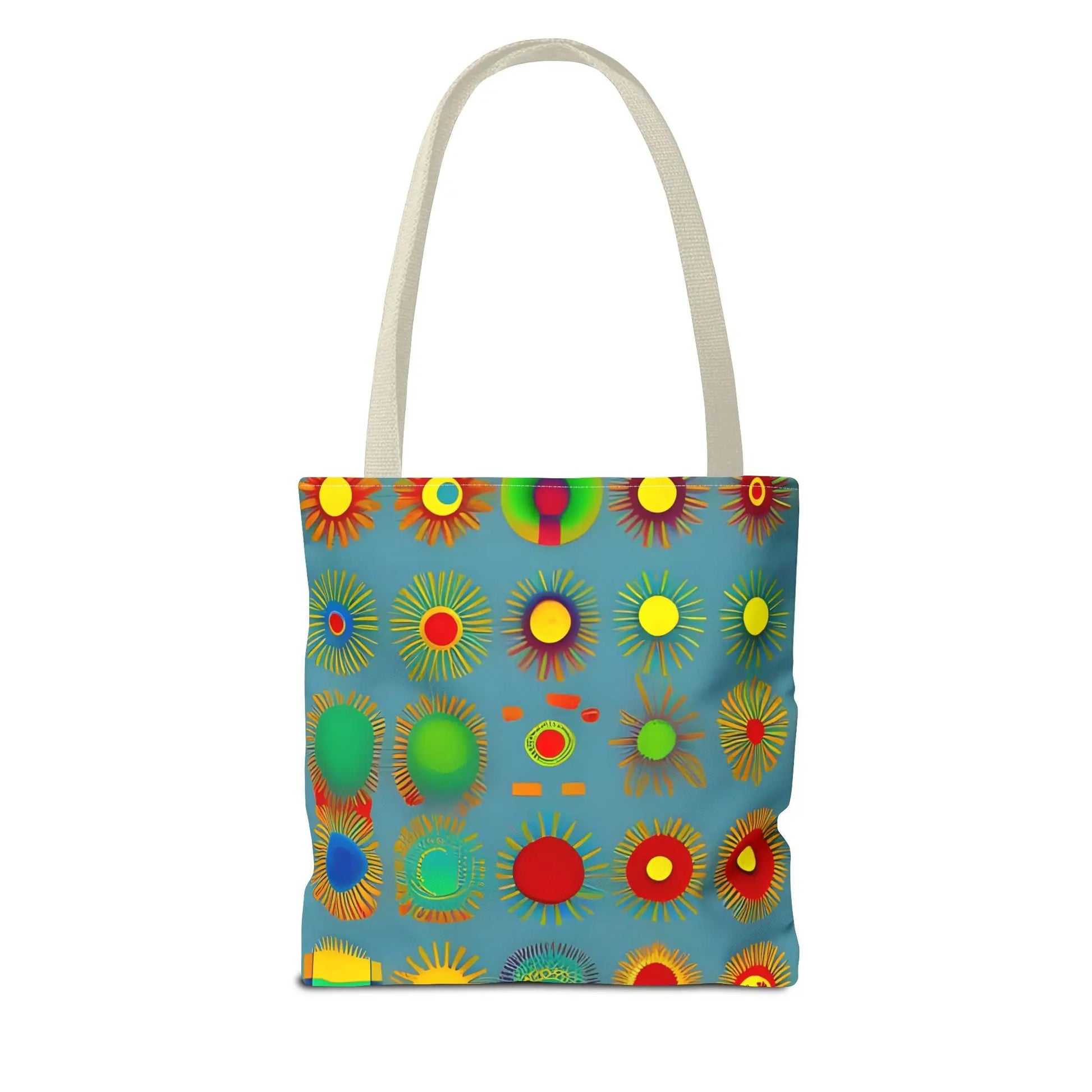 A vibrant blue sun pattern tote bag with colorful sunburst circles and white handles perfect for everyday use