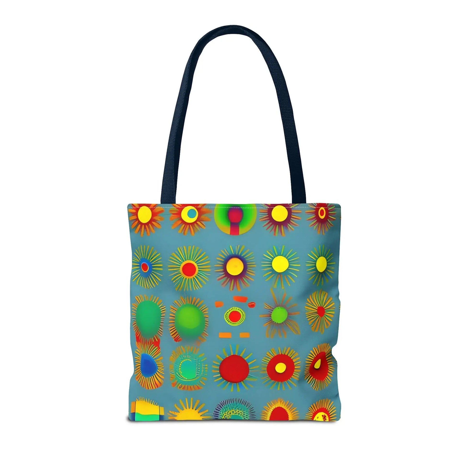 A vibrant blue sun pattern tote bag with colorful sunburst circles and navy fabric handles