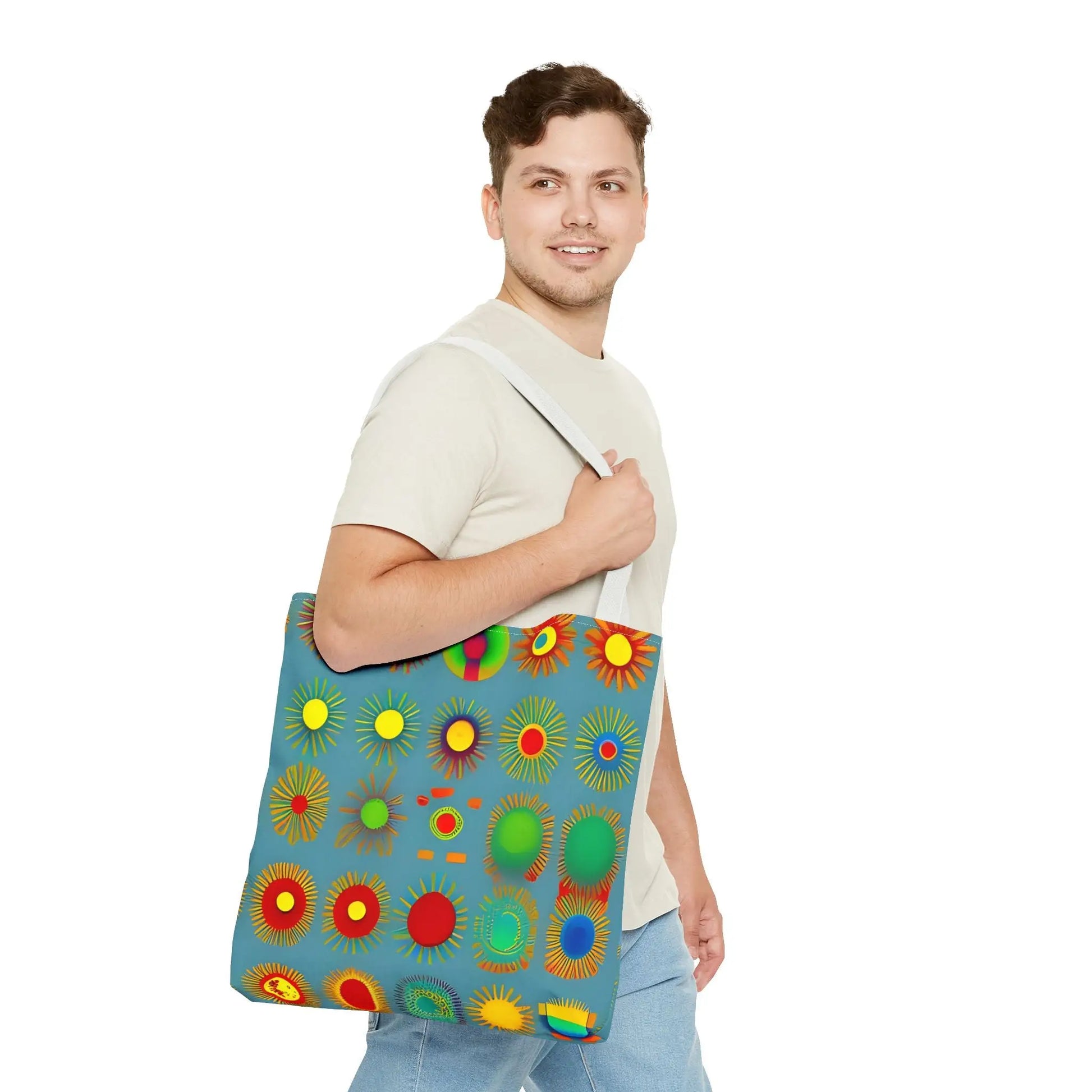 A vibrant blue sun pattern tote bag with colorful sunburst circles in red yellow green and orange pattern tote bag