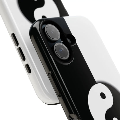 Back side of a glossy tough case featuring a black and white yin yang phone case design with durable protective material