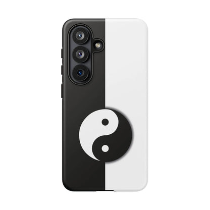 Black and white tough phone case with split yin yang black design centered on the back side dividing line